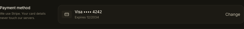 The saved payment method, showing a card ending in 4242 with its expiry date and a Change button.