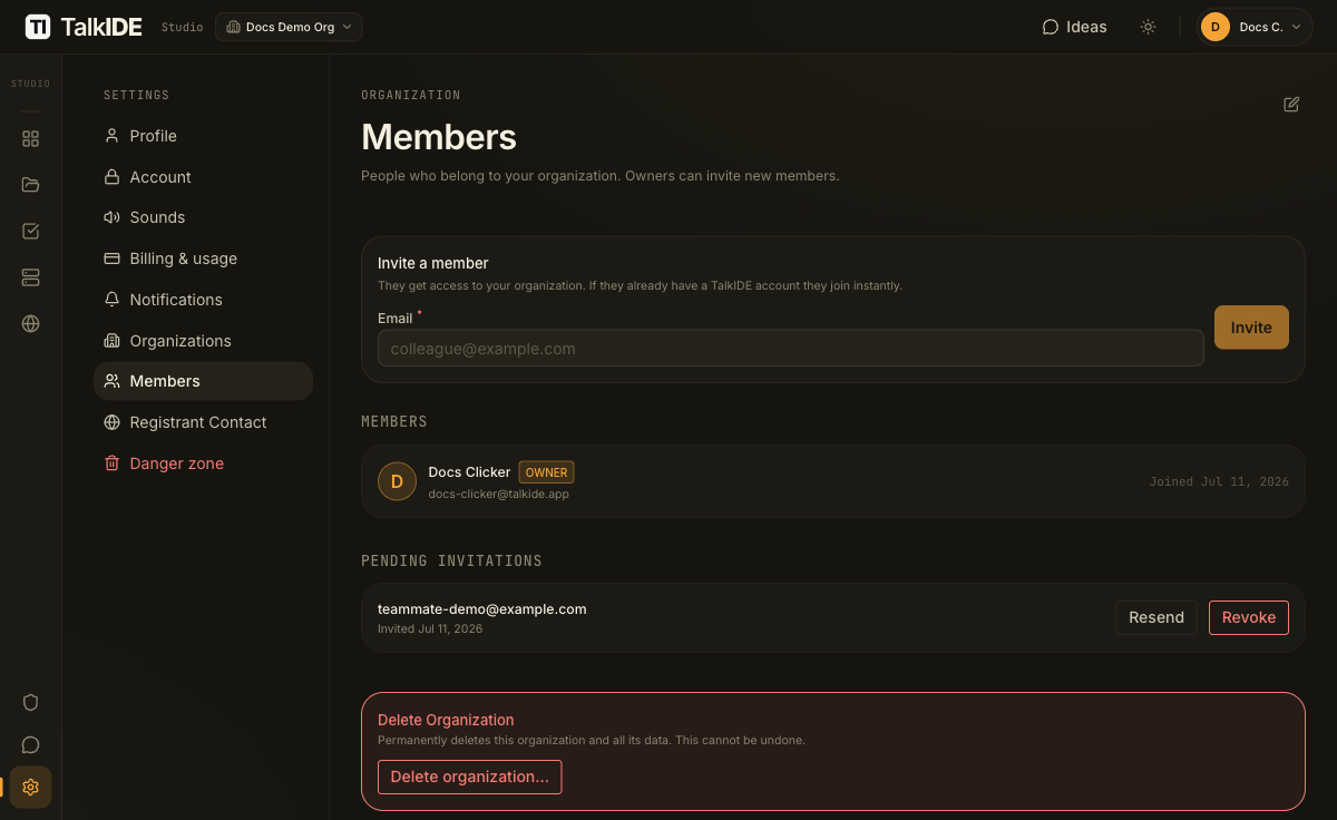The Members tab after inviting someone, with the new address listed under Pending Invitations alongside Resend and Revoke buttons.